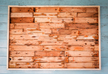 wooden square frame on old wall blank background