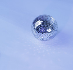 beautiful disco ball on yellow background isolated.