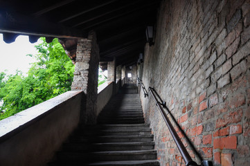 Fototapeta na wymiar City views of Budapest Hungary. Multi level stair case with brick wall and windows on a public path.