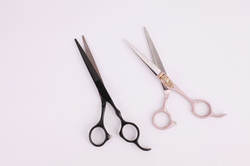 Top view professional scissors for haircuts isolated on white background