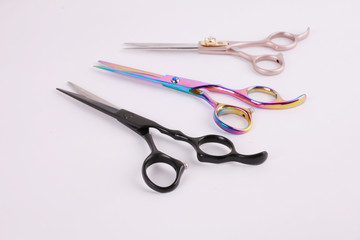 Top view professional scissors for haircuts isolated on white background