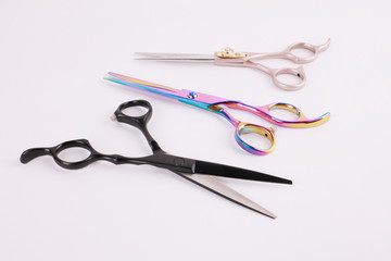 Top view professional scissors for haircuts isolated on white background
