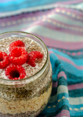 Breakfast with chia seeds, oats and raspberries