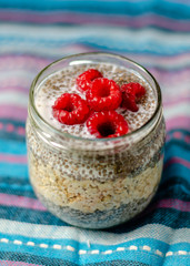 Chia seed pudding with oats and raspberries