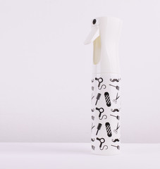 Hair spray bottle on white background