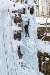 Man Ice Climbing