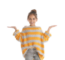 Pretty emotional preteen girl posing against white background