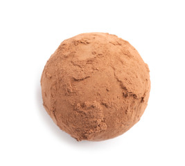 Delicious raw chocolate truffle on white background