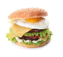 Tasty burger with fried egg on white background