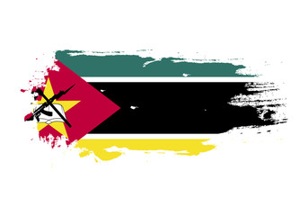 Grunge brush stroke with Mozambique national flag. Watercolor painting flag. Symbol, poster, banner. Vector Isolated on white background.
