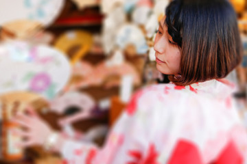 Obraz premium Young Japanese women in a kimono.