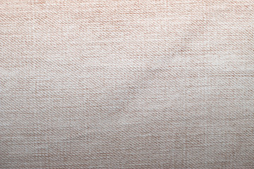 Shabby denim texture for background. Brown jeans 