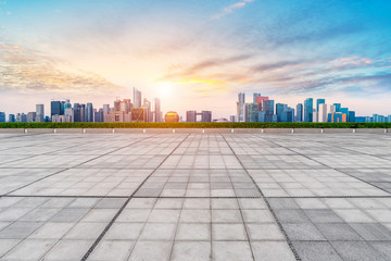 Urban skyscrapers with empty square floor tiles