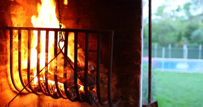 Home backyard Parilla barbecue fire