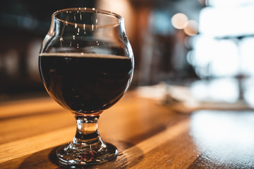 Glass of beer on bar