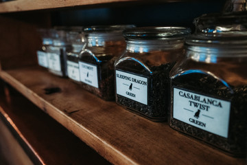 Tea containers on shelf