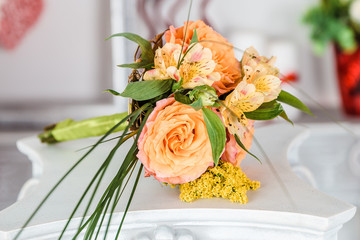 bouquet of large orange roses and Mimosas