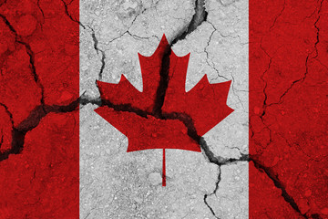 Canada flag on the cracked earth