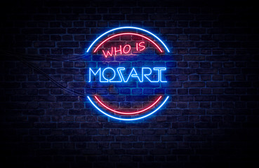 A red and blue neon sign on a brick wall that reads: Who is Mozart
