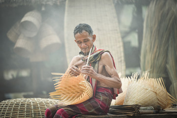 Asia life old man uncle grandfather working in home / Man elderly serious living in the countryside