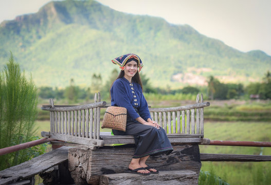 Asia woman thai style dress tribe Tai Dam / Portrait of beautiful young girl smiling