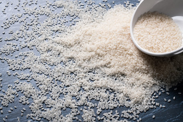 close up raw rice on table
