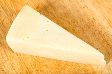 view of Pecorino Romano cheese on cutting board