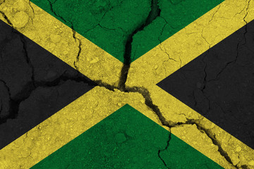 Jamaica flag on the cracked earth