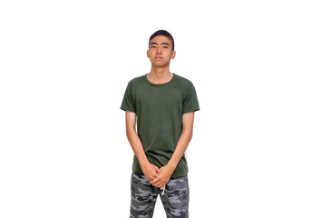 Fototapeta premium Young Thai man in short hair style with olive green shirt stands showing his bored face
