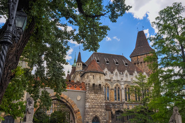 Fototapeta na wymiar Vajdahunyad Castle is a castle in the City Park of Budapest, Hungary. It was built in 1896 as part of the Millennial Exhibition