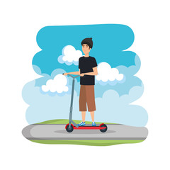 young man in folding scooter on road