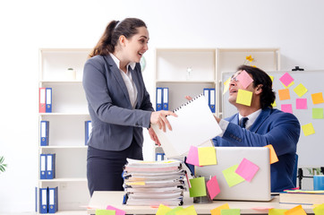 Two colleagues employees working in the office 