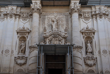 Obraz premium Decorations of the facade of the S.Giovanni Battista church (Basilica di S. Giovanni Battista) in Lecce, Puglia, Italy. A region of Apulia