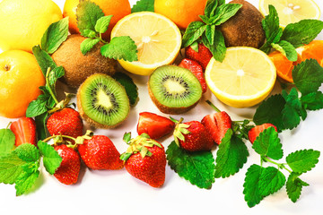 berries and citrus fruits on a white background.