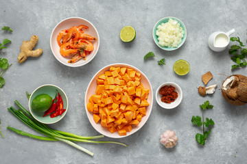 Raw ingredients making sweet potato soup shrimps top view