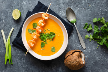 Sweet potato soup shrimps bowl top view