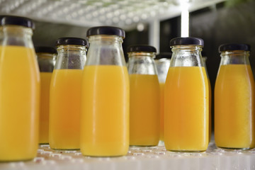 orange juice in bottles ready for drink,healthy drink
