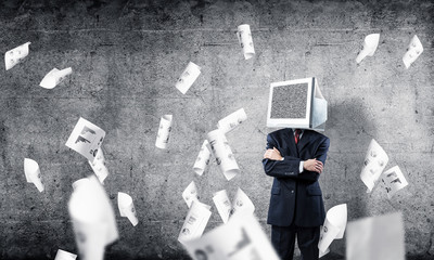 Businessman with monitor instead of head.