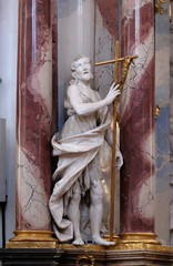 Saint John the Baptist statue on the altar in Benedictine monastery church in Amorbach, Germany