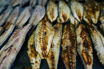 Grilled mackerel for a traditional Turkish fish dish in bread. Istanbul, Turkey