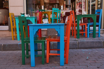 Fototapeta na wymiar Colorful tables and chairs on the street of Istanbul Turkey