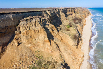 Mountain landslide in an environmentally hazardous area. Large crack in ground, descent of large...