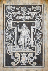 Detail of the decoration of the facade of Building of Pisa Superiore University on Piazza dei Cavalieri in Pisa, Italy