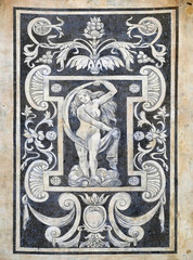 Detail of the decoration of the facade of Building of Pisa Superiore University on Piazza dei...