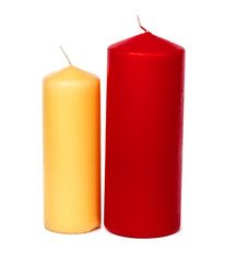 different size and colors candles isolated on a white background
