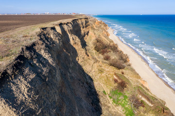 Mountain landslide in an environmentally hazardous area. Large crack in ground, descent of large...