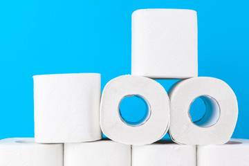 Toilet paper. Close up shot on blue background