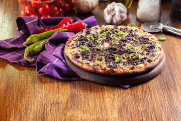 Spicy pizza with minced meat and jalopeno