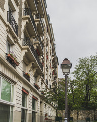 Fototapeta na wymiar Street lamp and buildings in Montmartre in Paris, France