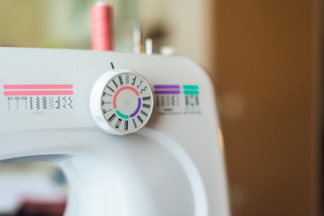 sewing machine with coils of thread